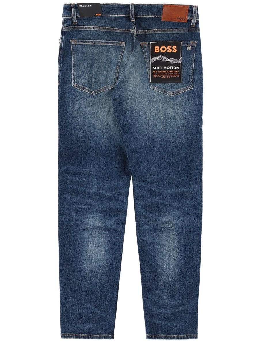 Tapered Stretch Jeans in Mid Blue