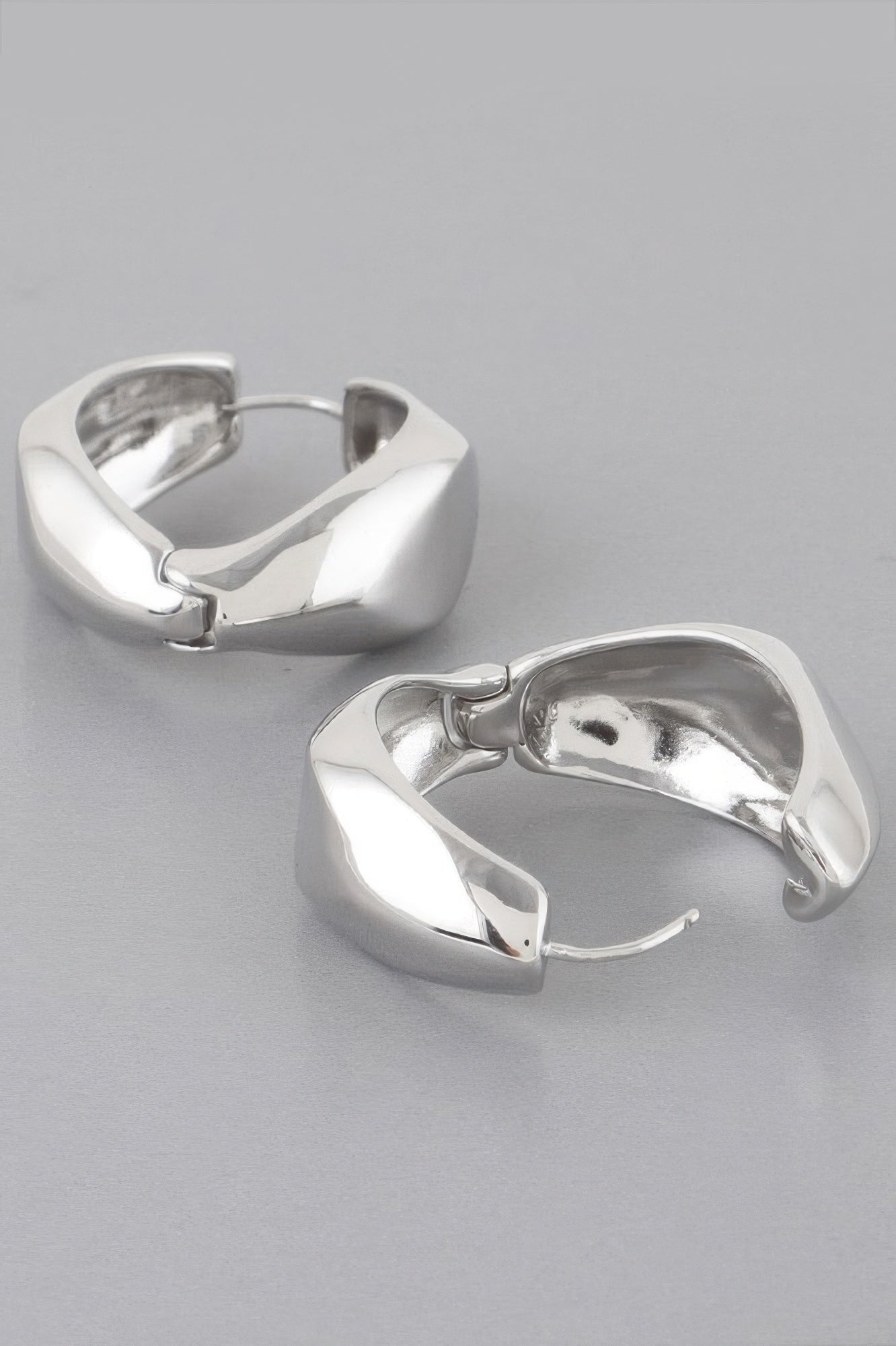 MEATPACKING Abstract Edge Hoop Earrings: NYFW BYMANYC ® New York