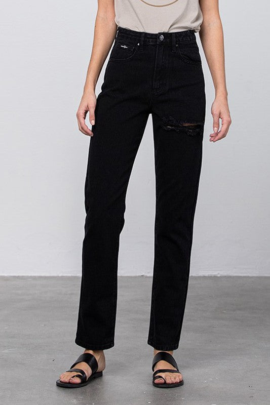 High Waist Destroyed Mom Jeans in black non-stretch denim with ripped knee, size 3, waist 28in; model 5 ft 9 in.