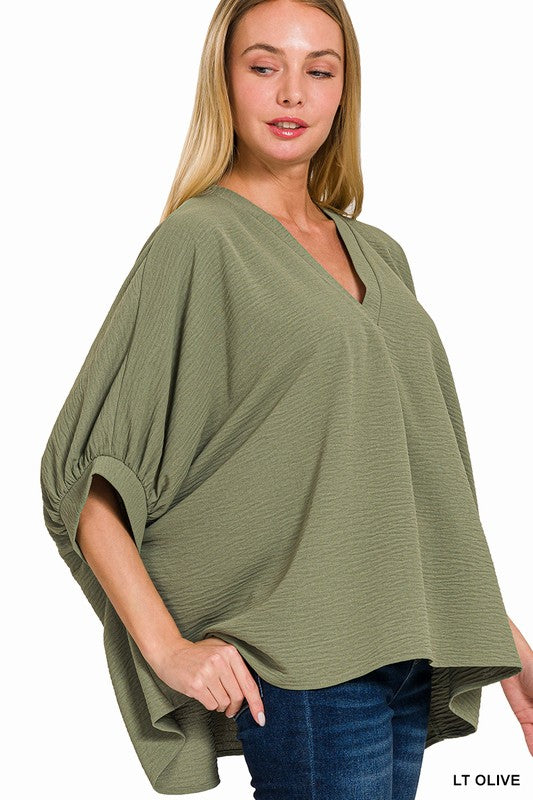 Woven Airflow V-Neck Puff Half Sleeve Top