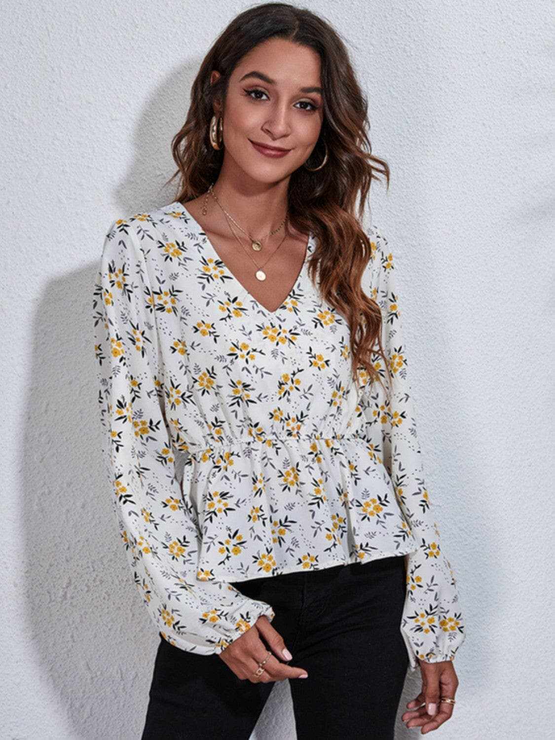 Trendsi Floral peplum blouse with v-neck