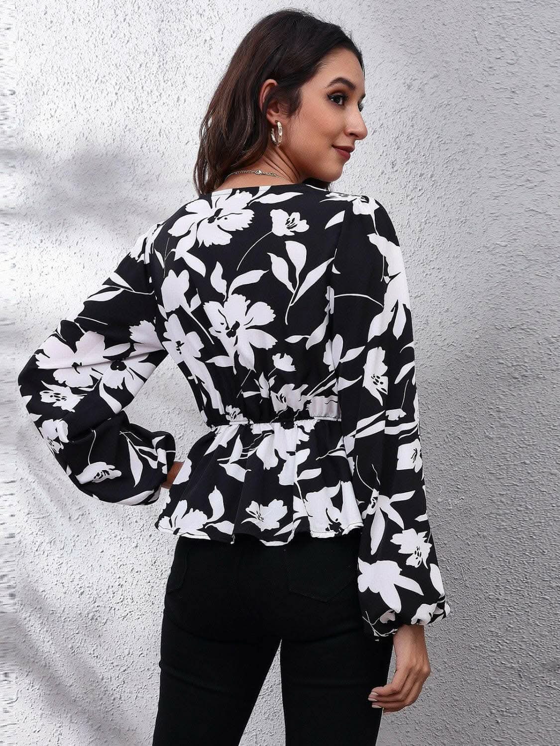 Trendsi Floral peplum blouse with v-neck