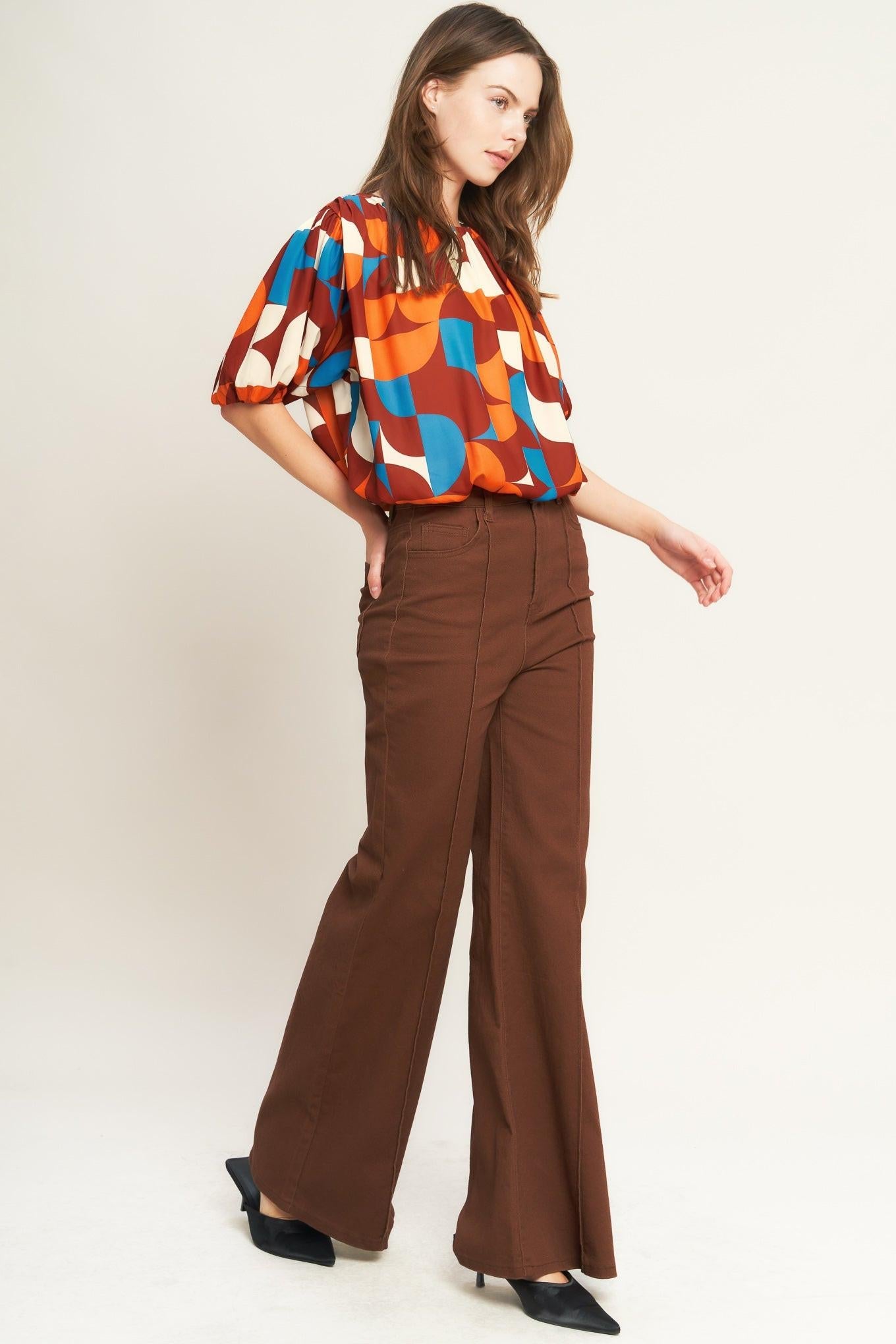 GONE IN A BLINK WOVEN TOP