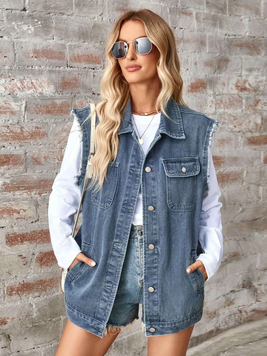 Trendsi Sleeveless denim jacket with raw hem