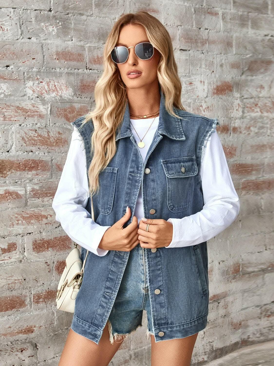 Trendsi Sleeveless denim jacket with raw hem