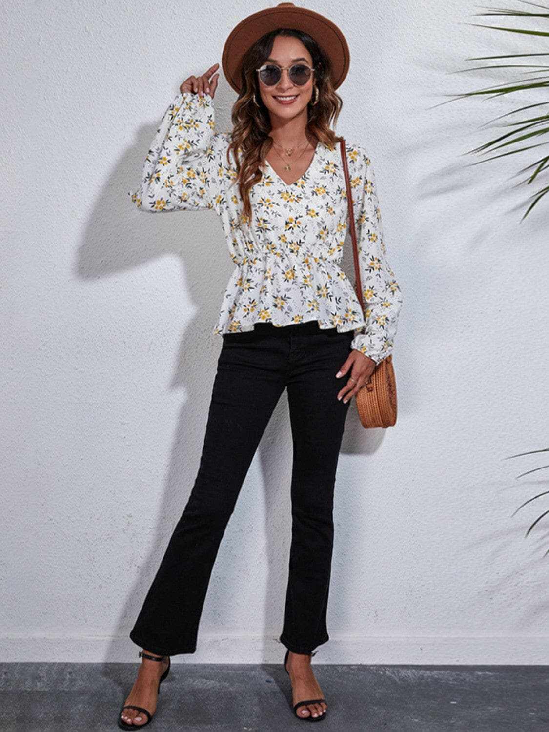 Trendsi Floral peplum blouse with v-neck