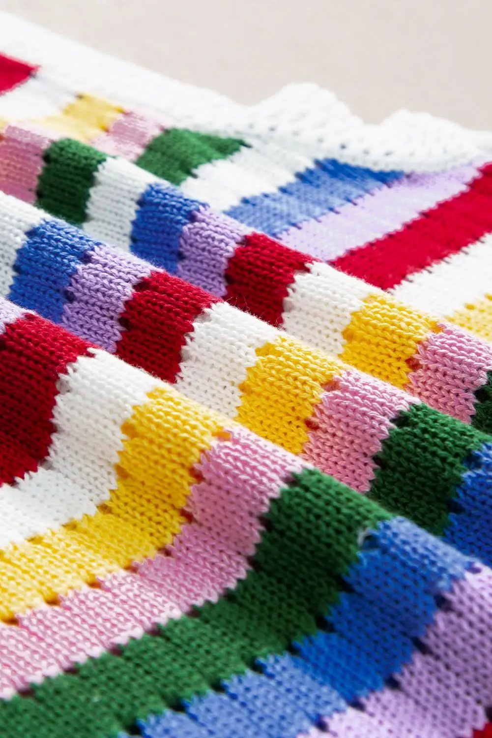 Love Salve Vibrant striped knitted vest with eyelet detail